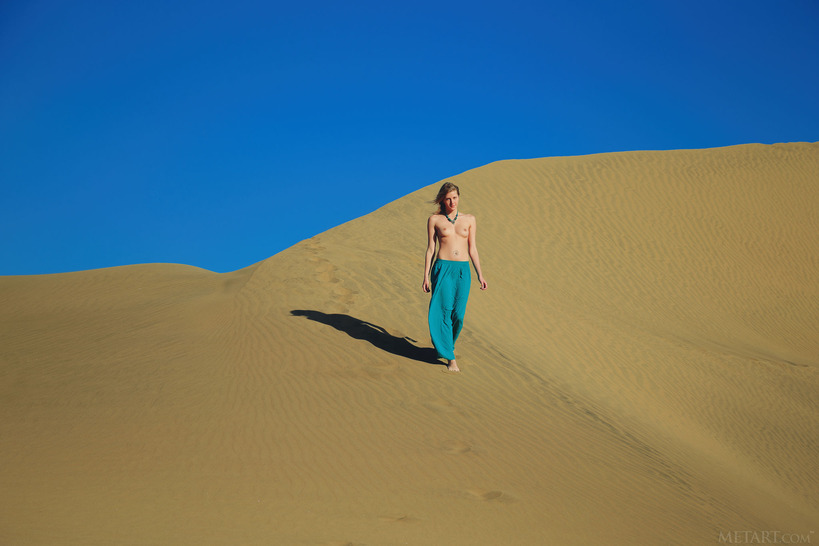 her breasts bared to the sun - 