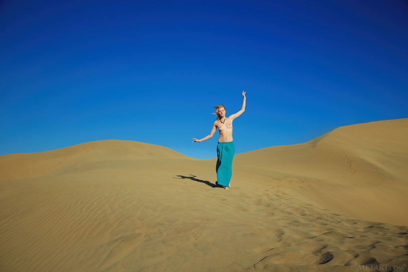 her breasts bared to the sun - 