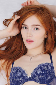 Porcelain pale beauty Jia Lissa lies on her bed in sexy blue lingerie - 01