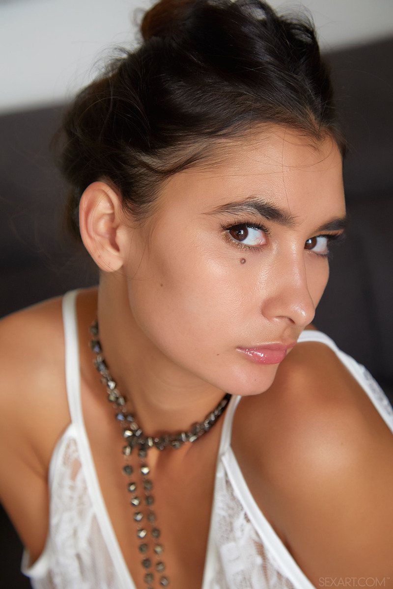 Gorgeous Bambi Joli perches on the edge of her chair - 