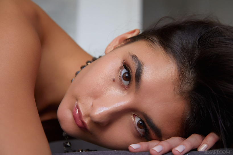 Gorgeous Bambi Joli perches on the edge of her chair - 